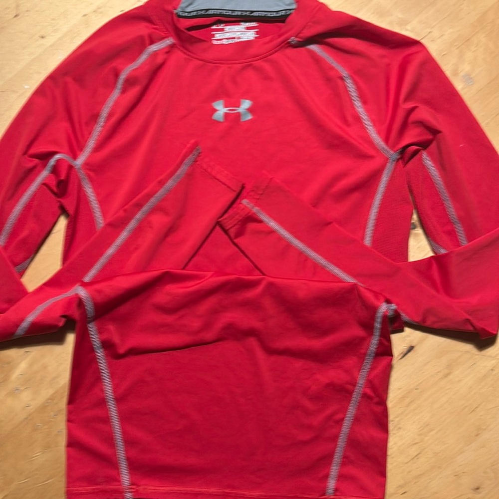 Under Armour men’s small red compression of sleeve shirt.